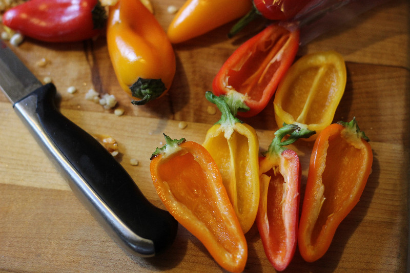 goat cheese and herb stuffed peppers cut