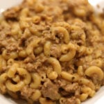 Crockpot Cheeseburger Casserole served on a white plate.