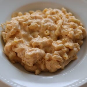 Creamy Crockpot Mac and Cheese served on a white plate
