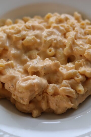 Creamy Crockpot Mac and Cheese served on a white plate