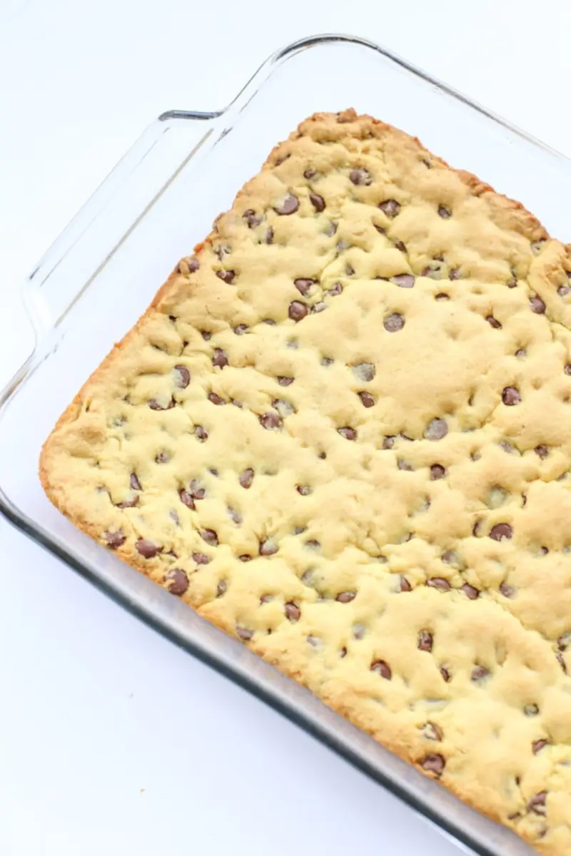 Cake mix chocolate chip cookie bars in a pan.