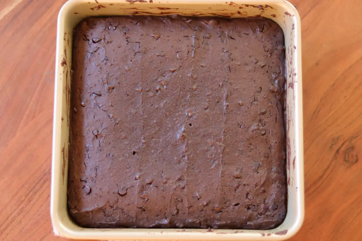 Fudgy brownies in an 8x8 inch pan after they have been baked.