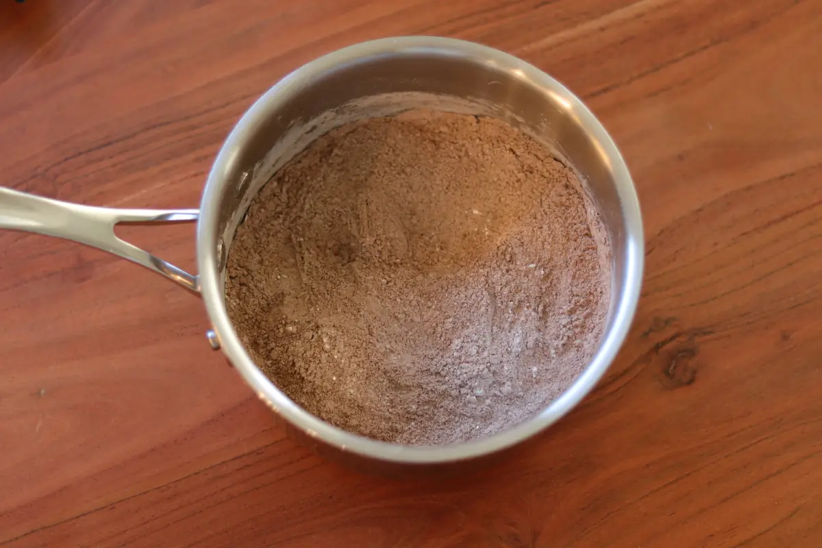 Cocoa powder, sugar, cornstarch, and salt, combined in a saucepan.