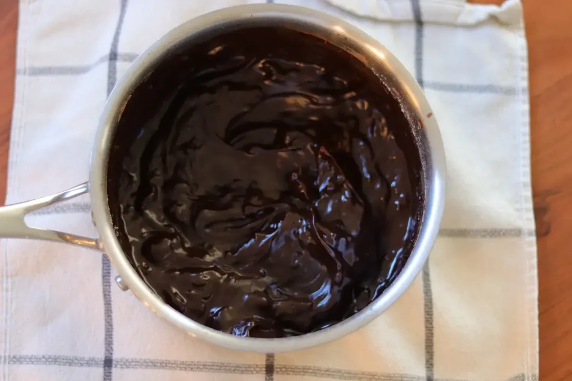 Fudgy brownie frosting in the saucepan.