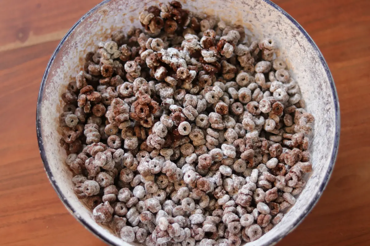 cheerios puppy chow in a large bowl.