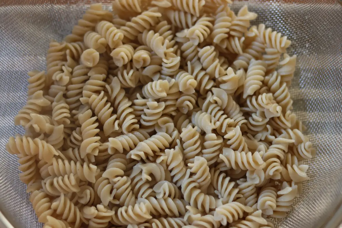 Pasta in a colander.