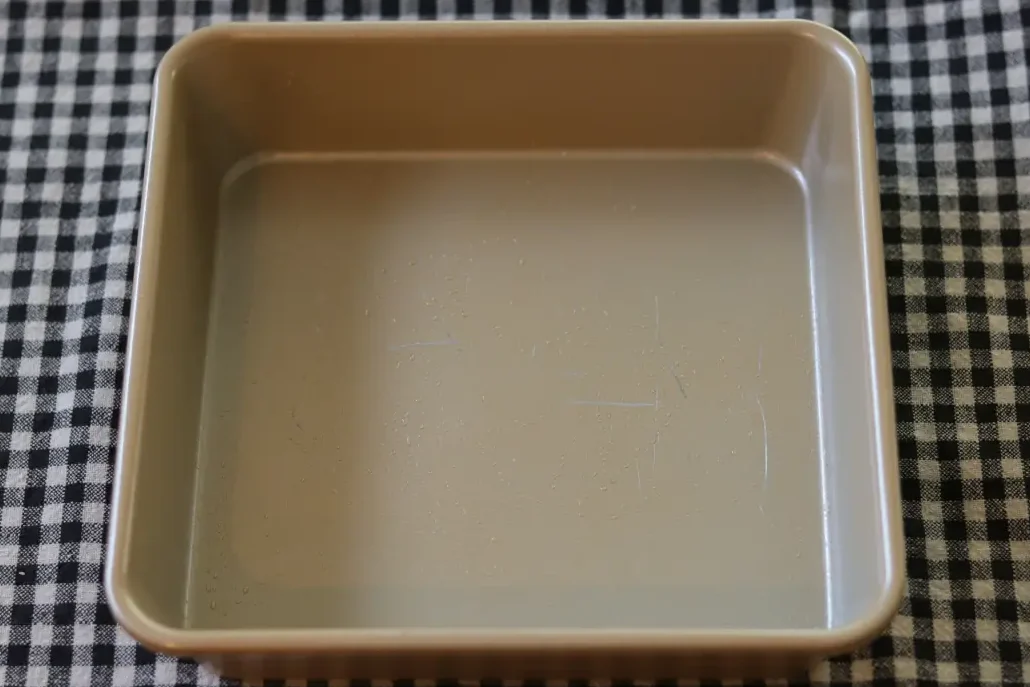 Prepared baking pan for the brownies.