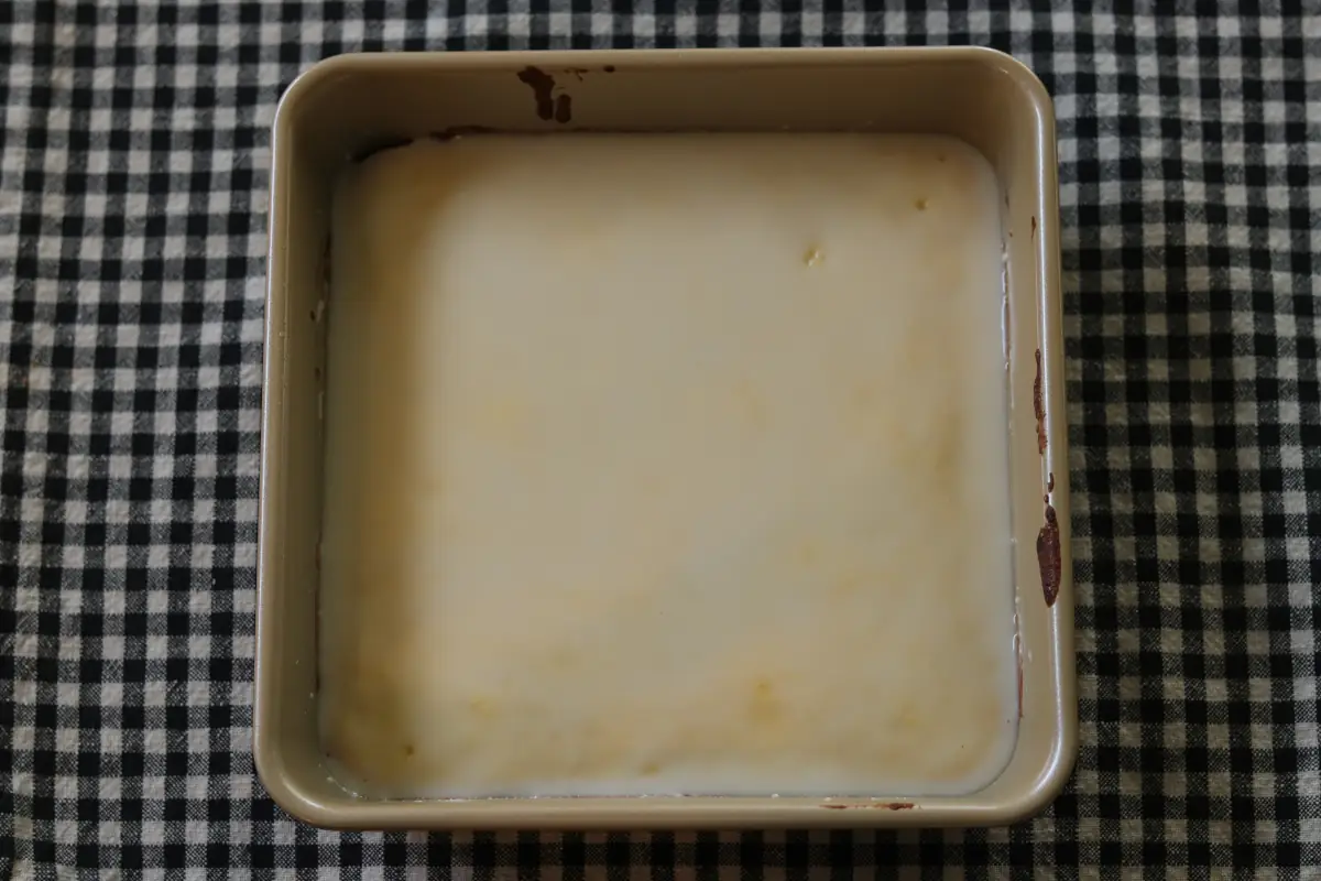 Lemon brownies that have been topped with glaze.