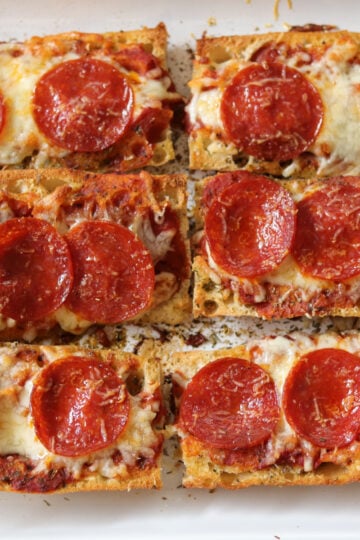Pizza boats on a platter.
