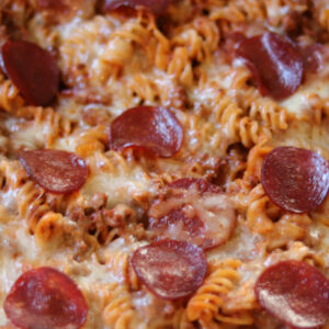 Close up photo of pizza pasta casserole.
