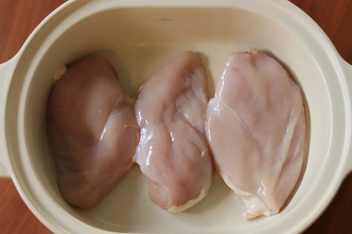 Raw chicken in the slow cooker.