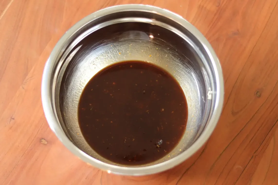 Citrus sauce mixed in a mixing bowl.