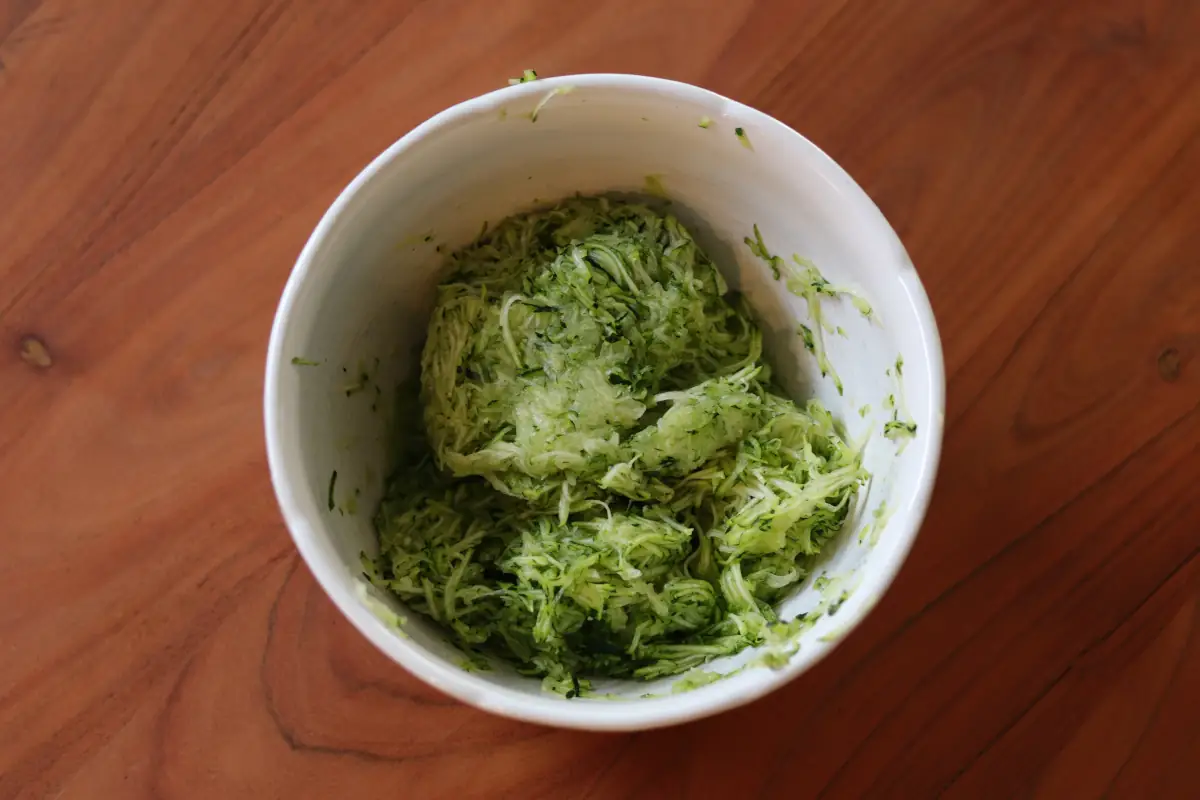 A bowl of shredded zucchini.