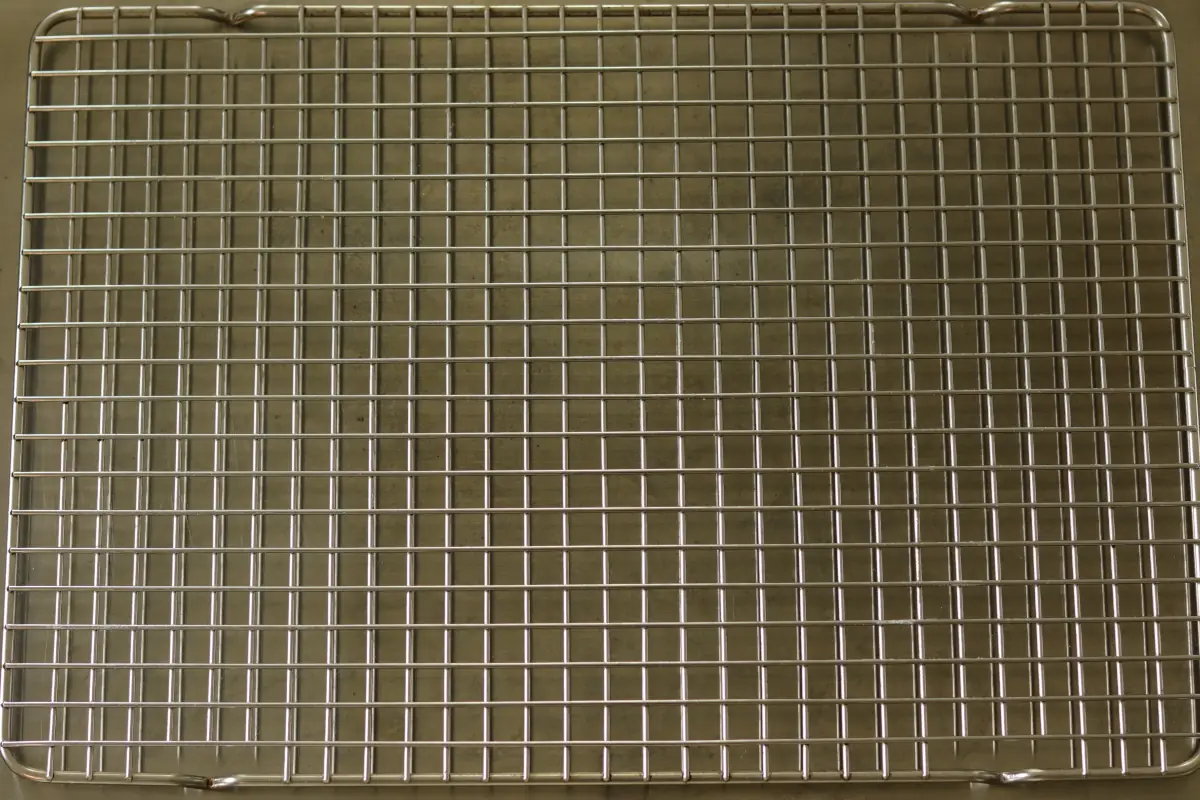 Wire rack over a baking sheet.