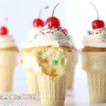Ice cream cone cupcakes topped with a cherry.