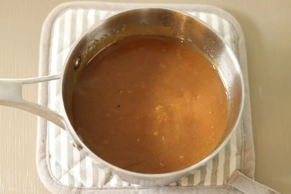 Teriyaki sauce that has been thickened in a pot.