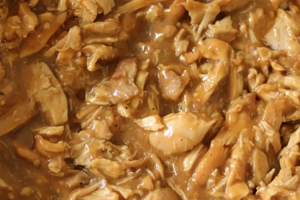 Chicken that has been tossed with the finished teriyaki sauce.