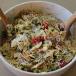 zesty italian pasta salad in a white bowl