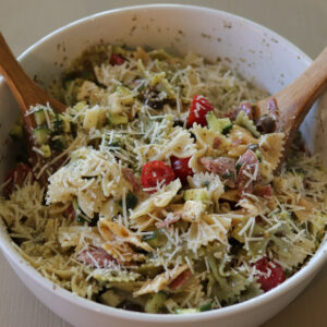 zesty italian pasta salad in a white bowl